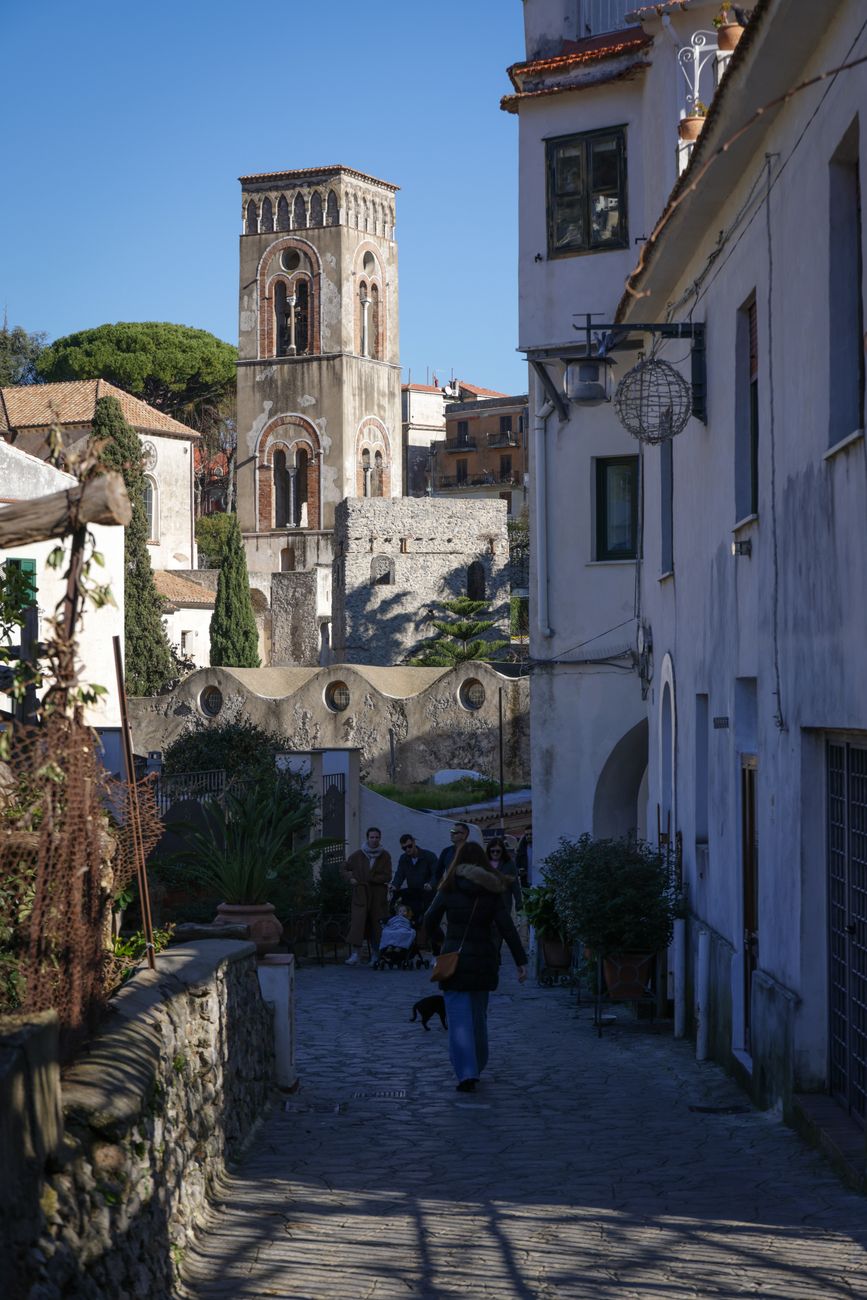 Historic architecture and sunlit cobblestone lanes in Southern Europe